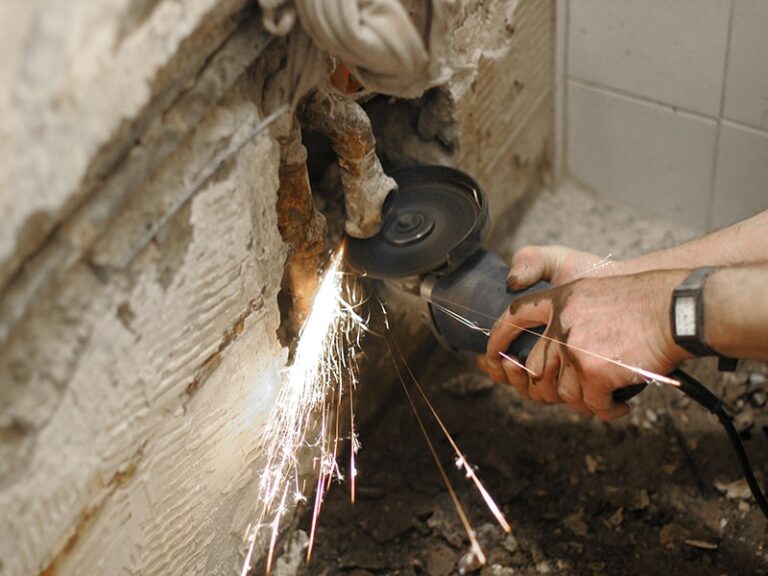 Angle grinder or circular saw used to cut the concrete